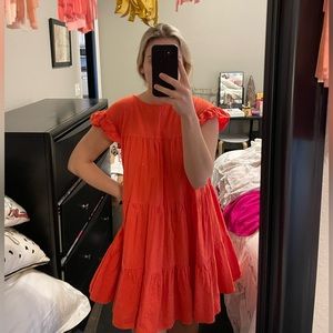 Small boutique orange/red babydoll mini dress